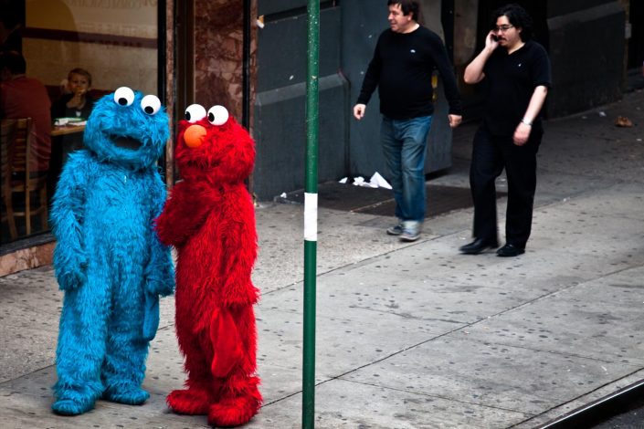 Tickle me for a cookie, Elmo and Cookiemonster on Time Square NYC. Street Photography by Victor Borst