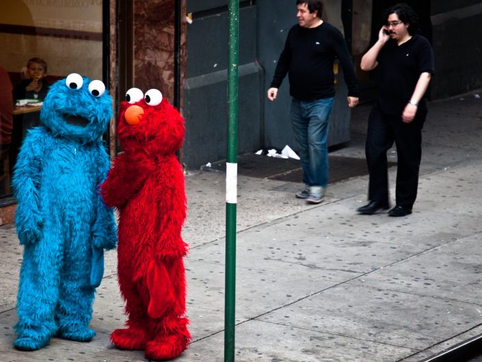 Tickle me for a cookie, Elmo and Cookiemonster on Time Square NYC. Street Photography by Victor Borst