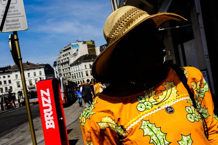Colorful Portrait at Brussels of an African woman. Street photography by Victor Borst