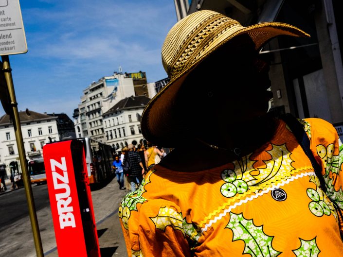 Colorful Portrait at Brussels of an African woman. Street photography by Victor Borst